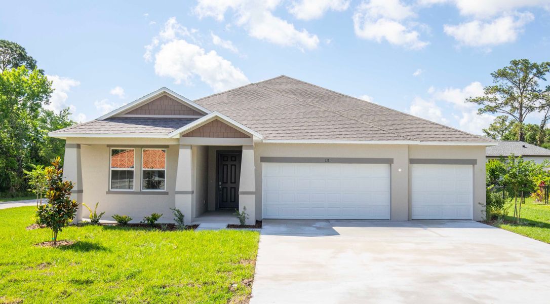 Front exterior of a home in the Palm Coast community, located in Palm Coast, FL (Image 14).