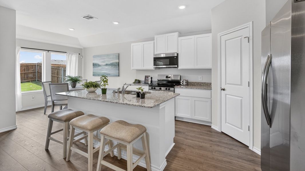 Furnished interior in a model home at Forestbrook Estates in Paris (Image 10).