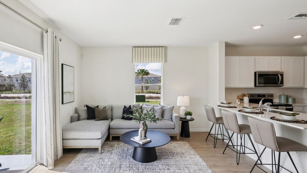 Furnished interior in a model home at Towns at Woodsdale in Wesley Chapel (Image 10).