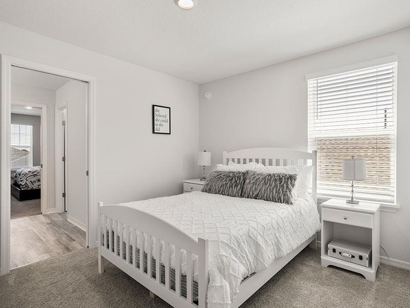Secondary bedrooms provide space for everyone in your household - Wesley II model home in Winter Haven, FL