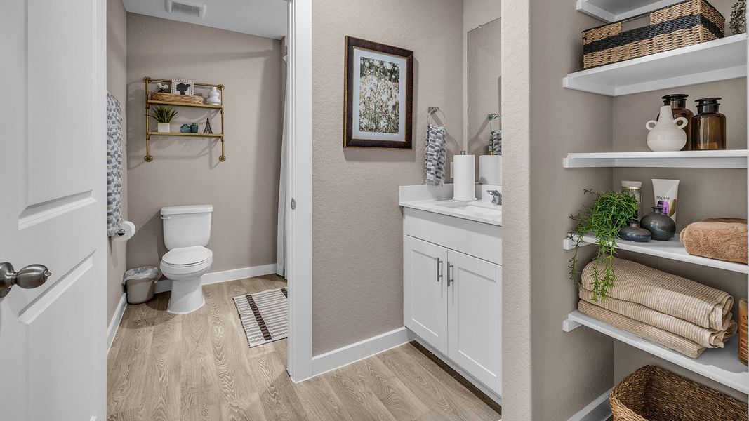 Furnished interior in a model home at Sonoma Oaks in Fredericksburg (Image 9).