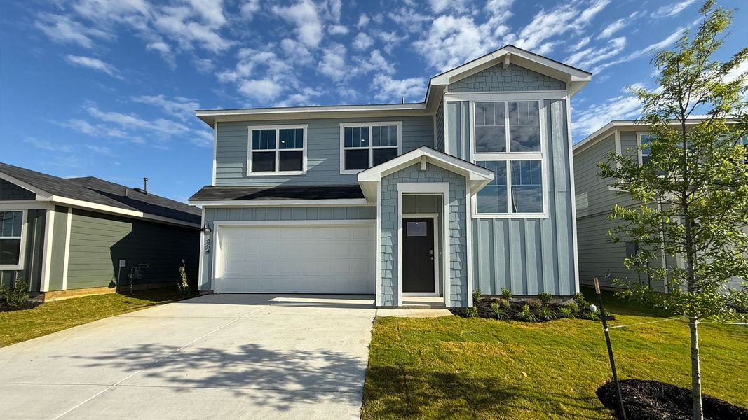 Front exterior of a home in the Valverde community, located in Bastrop, TX (Image 5). Front exterior of a home in the Valverde community, located in Bastrop, TX (Image 5).
