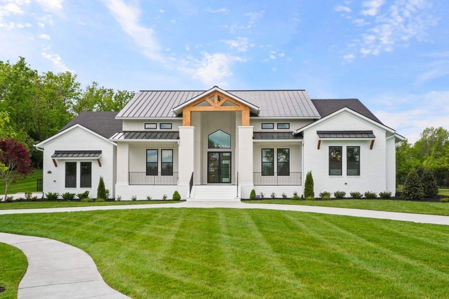 Front exterior of a home in the Primm Farm community, located in Brentwood, TN (Image 10). Front exterior of a home in the Primm Farm community, located in Brentwood, TN (Image 10).