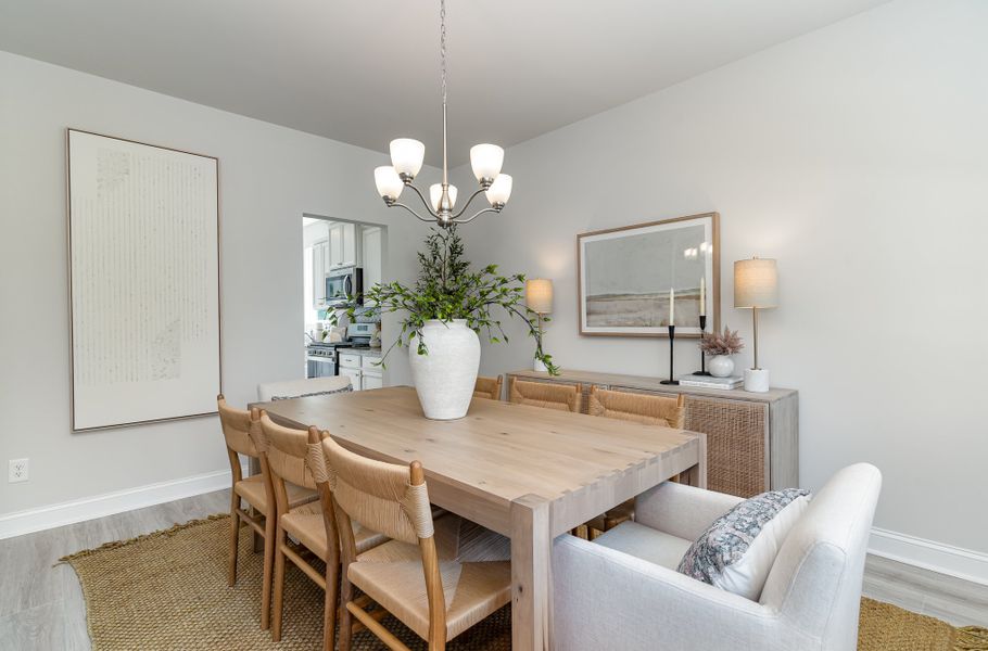 Furnished interior in a model home at Waterbridge in Myrtle Beach (Image 61).