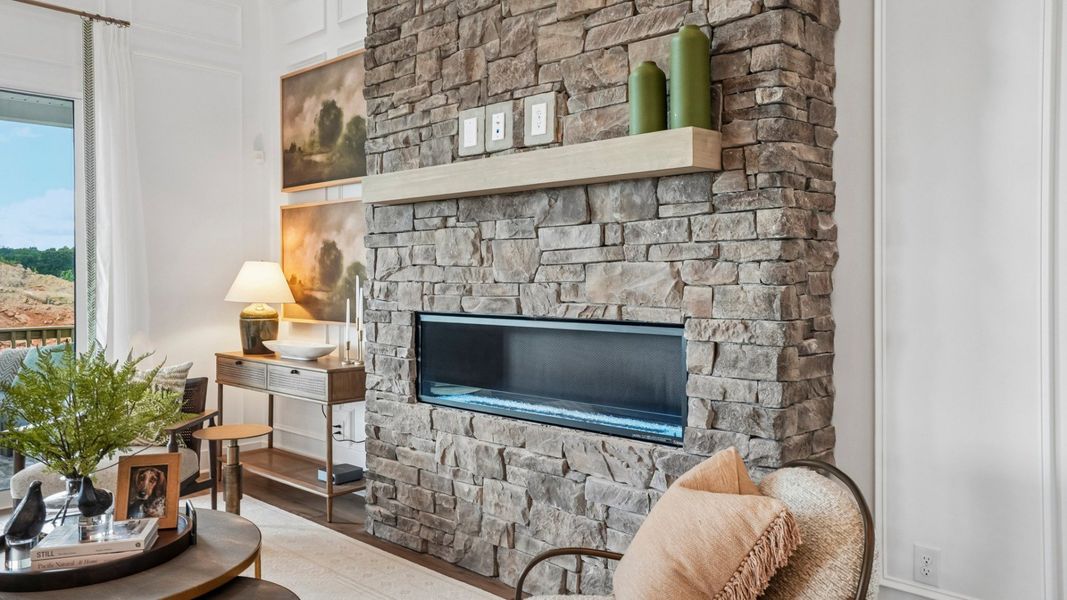 Close-up of gathering room with focus on the brick fireplace Close-up of gathering room with focus on the brick fireplace
