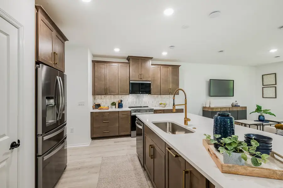 Furnished interior in a model home at Towns at Greenleaf in Oviedo (Image 4).