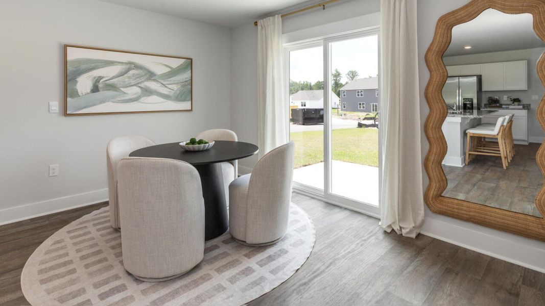 Furnished interior in a model home at Eagle Creek in Bolivia (Image 11).