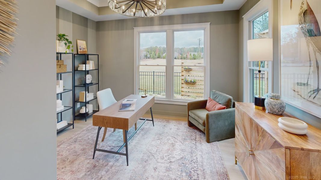 Furnished interior in a model home at The Courtyards by The Manor in Alpharetta (Image 10).