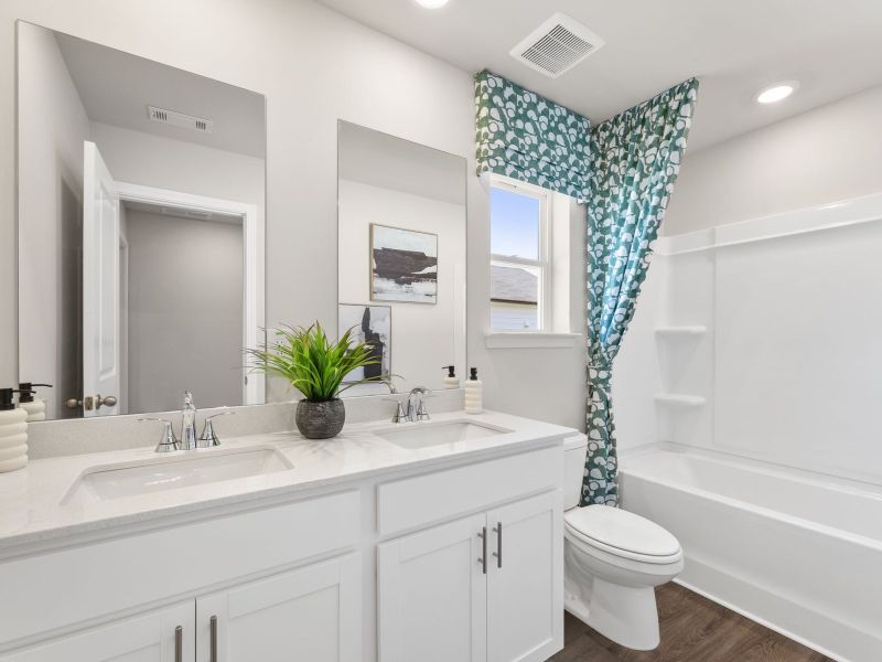Furnished interior in a model home at Martin Springs - Cottage Series in Lawrenceville (Image 19).