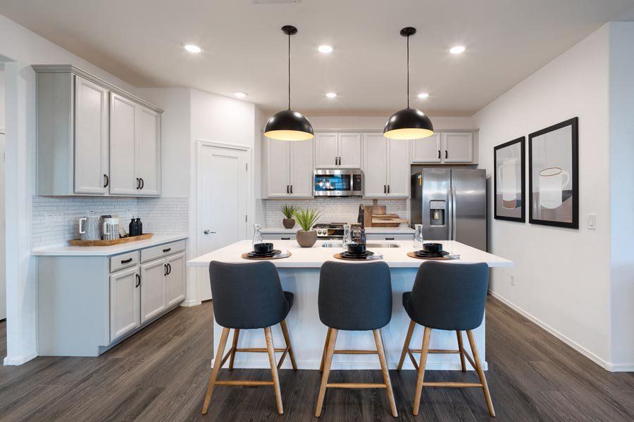 Furnished interior in a model home at Ryder Ranch in Surprise (Image 11).