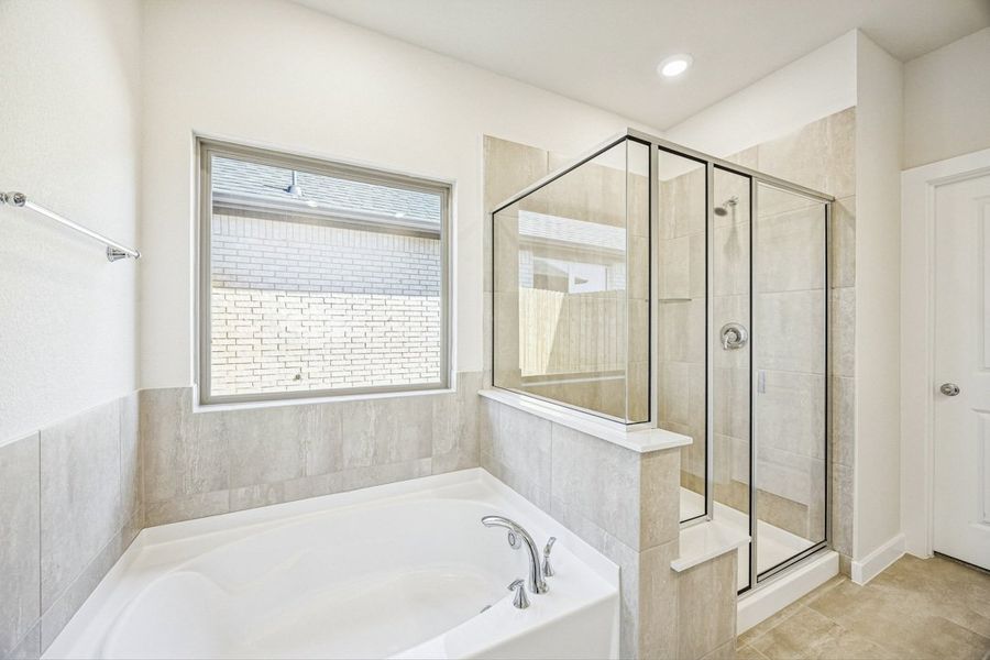 Furnished interior in a model home at Freeman Farm in Kaufman (Image 39).