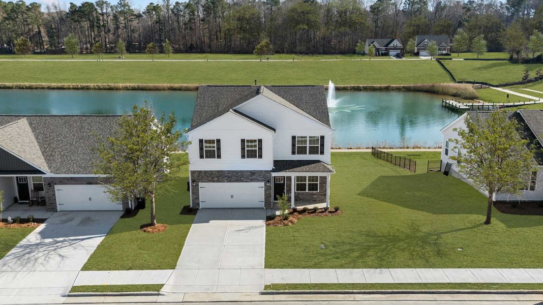 Front exterior of a home in the Tyler - Home on the Lake community, located in New Bern, NC (Image 9).
