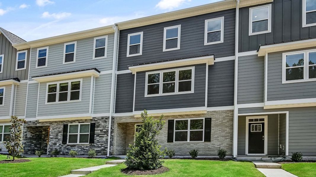 Front exterior of a home in the The Townes Park community, located in Apex, NC (Image 11). Front exterior of a home in the The Townes Park community, located in Apex, NC (Image 11).