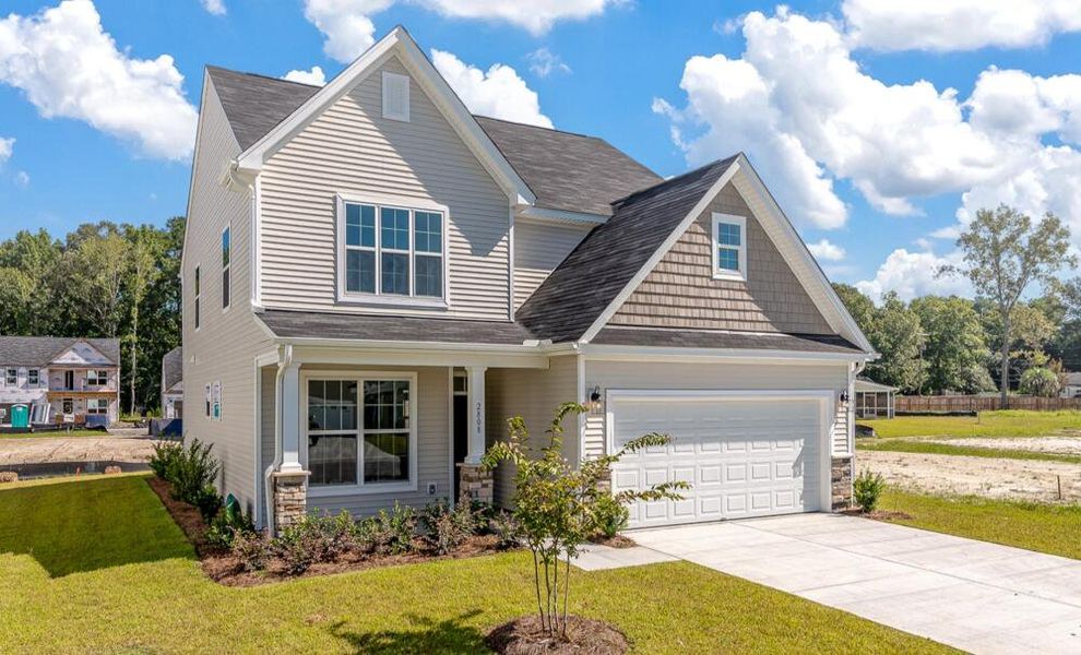 Front exterior of a home in the Black Forest Pointe community, located in Benson, NC (Image 9).