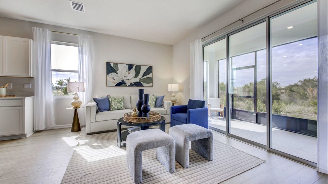 Furnished interior in a model home at The Gardens at Bay Street in Sarasota (Image 21).