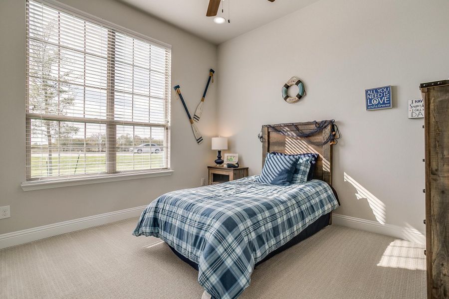 Furnished interior in a model home at Creekview Farms in Greenville (Image 39).