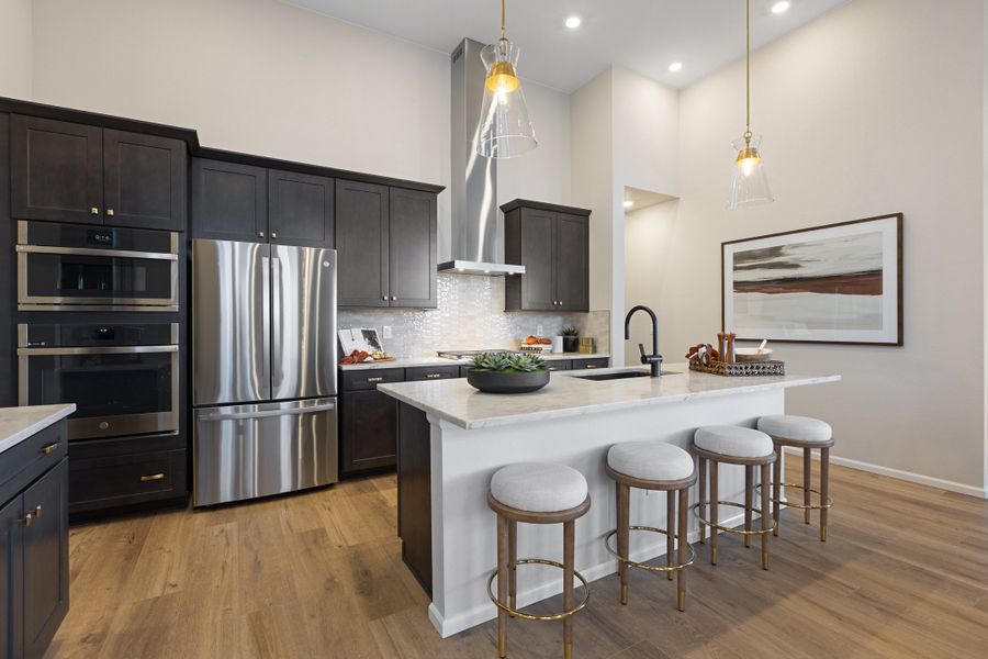 Furnished interior in a model home at The Estates Collection at Murphy Creek in Aurora (Image 6).