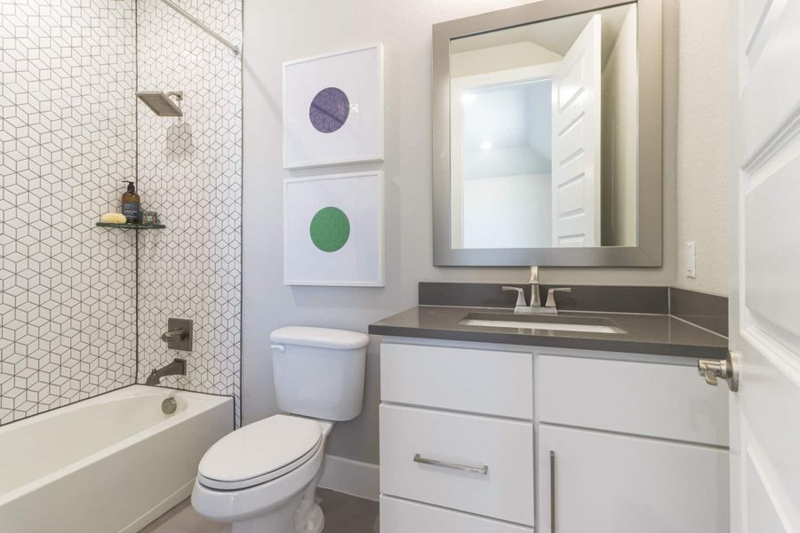 Furnished interior in a model home at Crescent Bluff in Georgetown (Image 33).