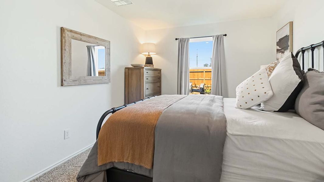 Furnished interior in a model home at Hickory Ridge in Elmendorf (Image 19).