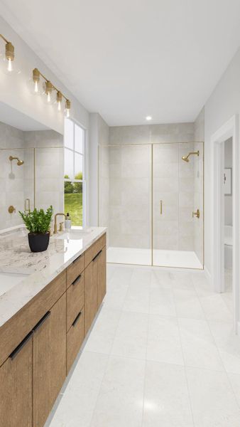 Spa-like primary bath boasts dual vanities and a frameless glass shower Spa-like primary bath boasts dual vanities and a frameless glass shower