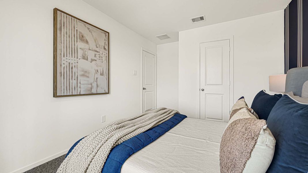 Furnished interior in a model home at August Trails in Needville (Image 25). Furnished interior in a model home at August Trails in Needville (Image 25).