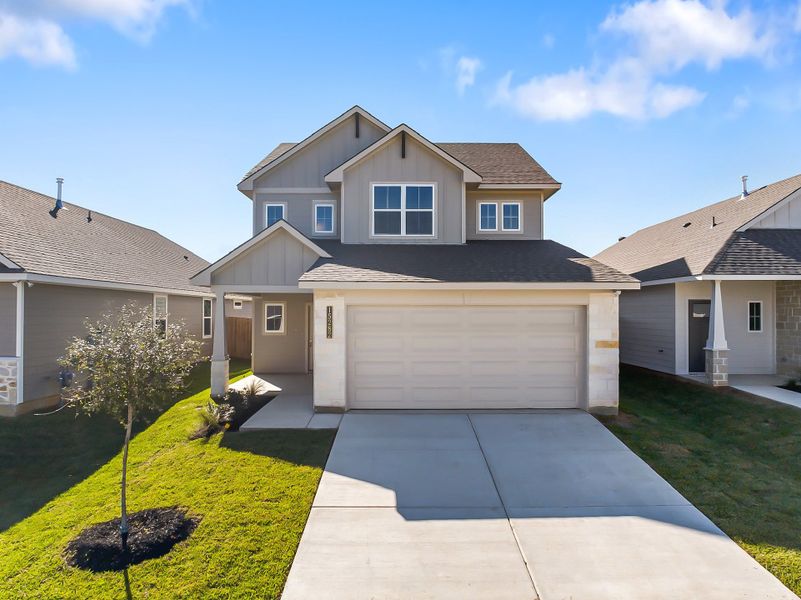 Front exterior of a home in the Heartland at Vintage Farms community, located in Brenham, TX (Image 10).