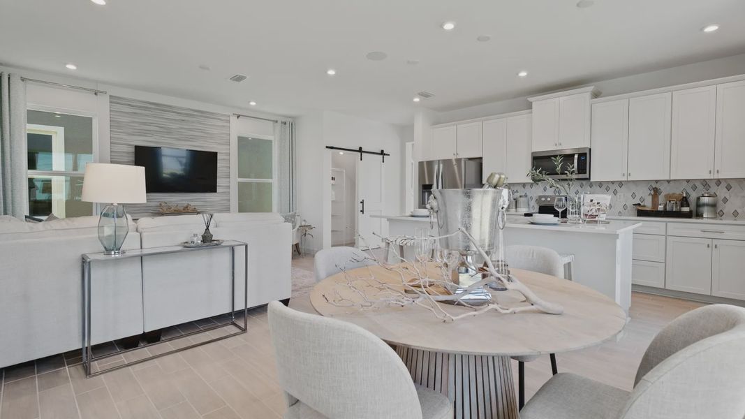 Spacious kitchen, living, and dining areas flow together seamlessly—ideal for everyday living and effortless entertaining.