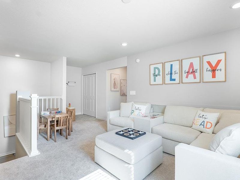 Upstairs, a loft provides flexible-use space - Aria model home in St. Cloud, FL Upstairs, a loft provides flexible-use space - Aria model home in St. Cloud, FL