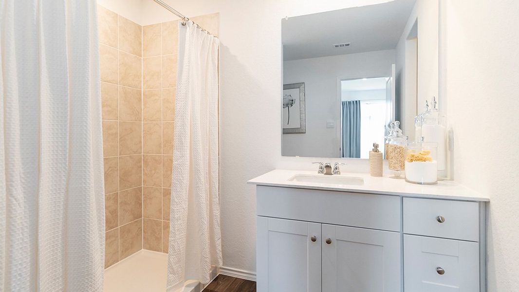 Furnished interior in a model home at Preserve at Medina in Von Ormy (Image 39).