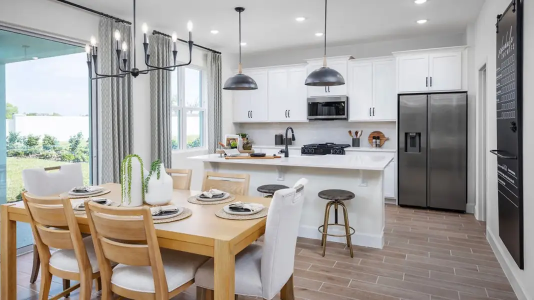 Furnished interior in a model home at Cypress Reserve in Clermont (Image 3).