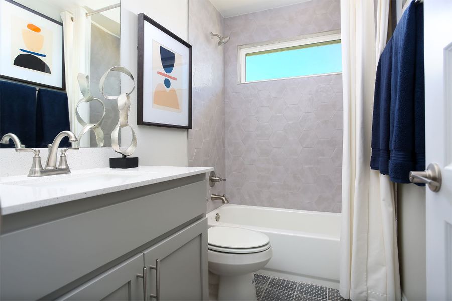 Furnished interior in a model home at Harvest Ridge in Elgin (Image 43).