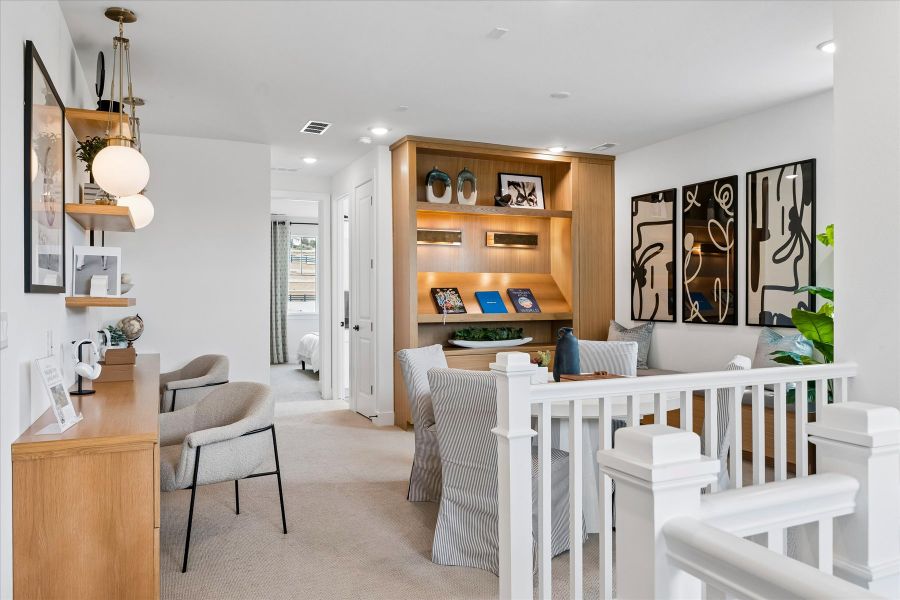 A room with white furniture.