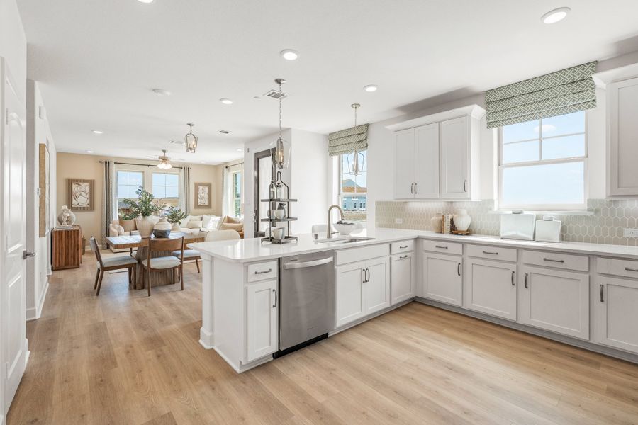 Furnished interior in a model home at Waterbend: Ivy Townhomes in Euless (Image 2).