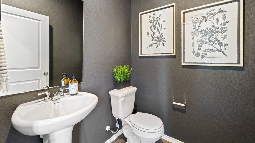 Furnished interior in a model home at The Reserve at Spiritas Ranch in Little Elm (Image 21).