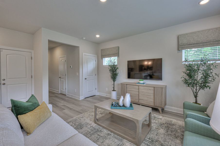 Enjoy family nights in the spacious great room. Enjoy family nights in the spacious great room.