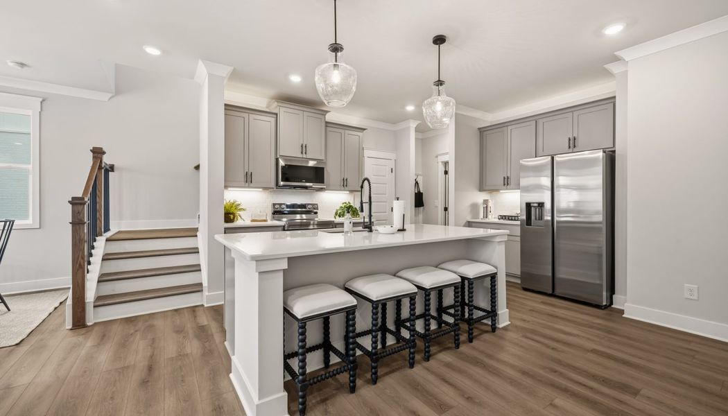 Furnished interior in a model home at Millstone at Mundy Mill in Gainesville (Image 15).