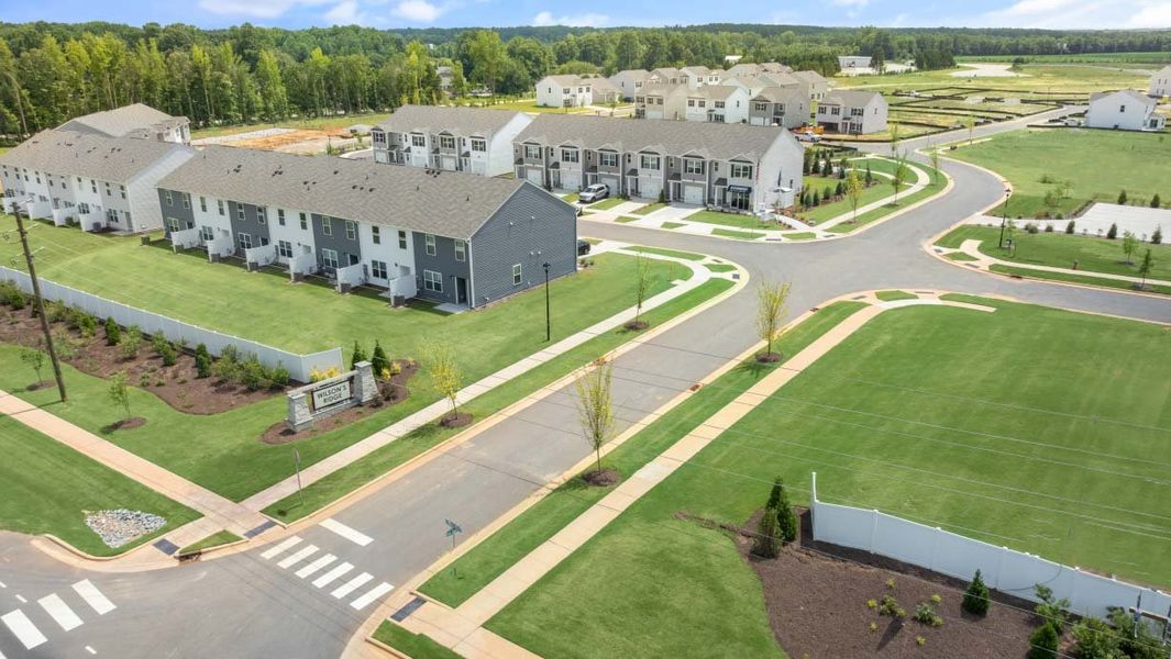 Front exterior of a home in the The Townes at Wilson's Ridge community, located in Wilson's Mills, NC (Image 18).