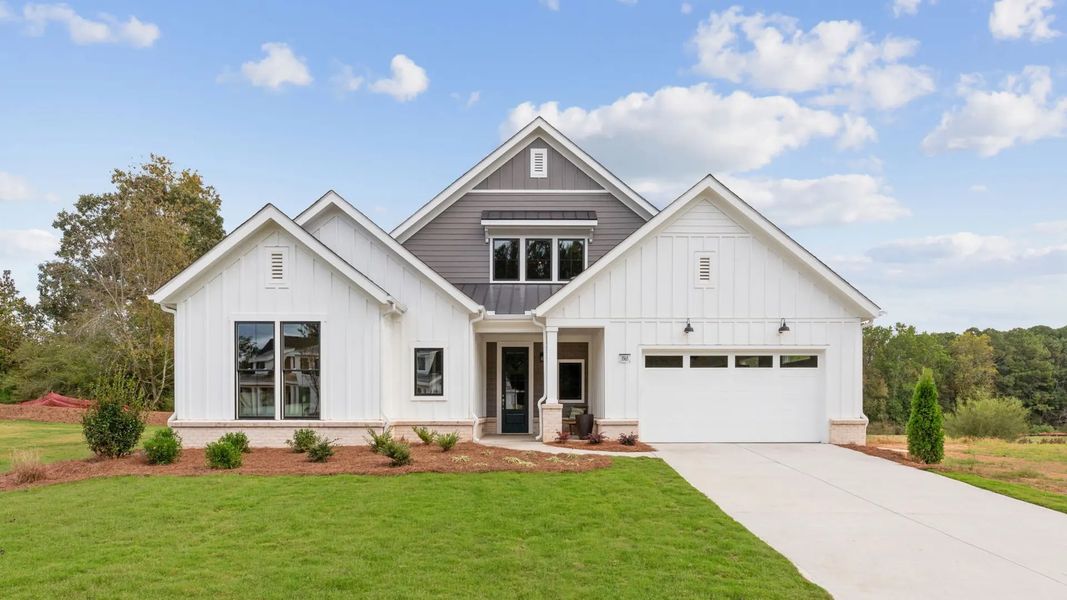 Front exterior of a home in the The Courtyards at Summit Hill community, located in Dallas, GA (Image 2).