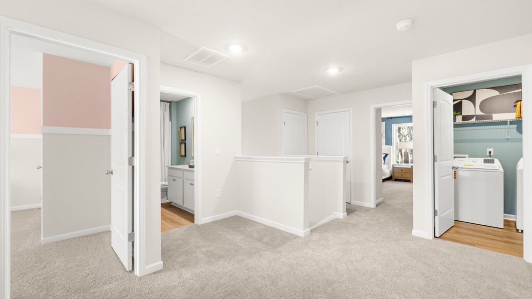 Furnished interior in a model home at Liberty Crossing in Braselton (Image 15).