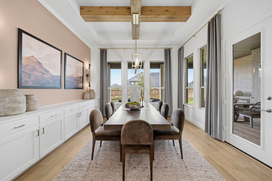 Furnished interior in a model home at Mustang Lakes in McKinney (Image 20).