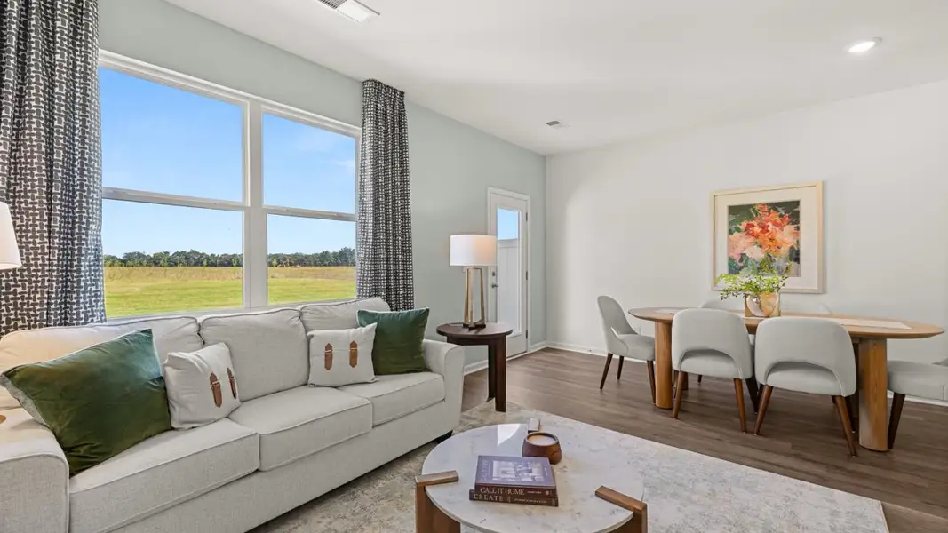 Furnished interior in a model home at The Gables at Agricultural Village in Perry (Image 7).