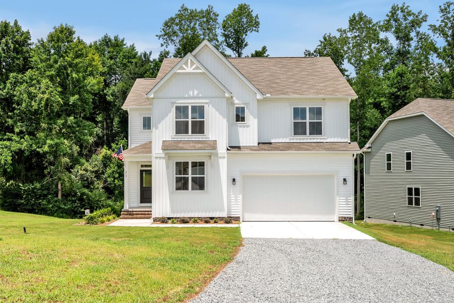 Front exterior of a home in the Alder Creek community, located in Benson, NC (Image 13). Front exterior of a home in the Alder Creek community, located in Benson, NC (Image 13).