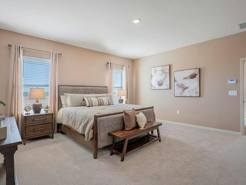 These Lakeland new homes include a spacious owner`s suite - Monroe home plan