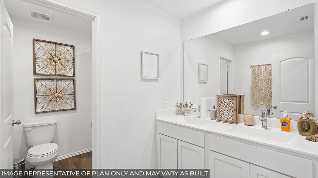 Furnished interior in a model home at East Williams Cove in Conroe (Image 7). Furnished interior in a model home at East Williams Cove in Conroe (Image 7).