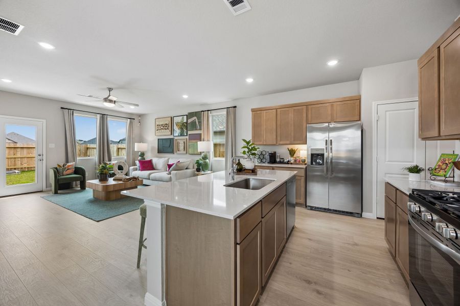 Kitchen in the Oak Model Home by Trophy Signature Homes