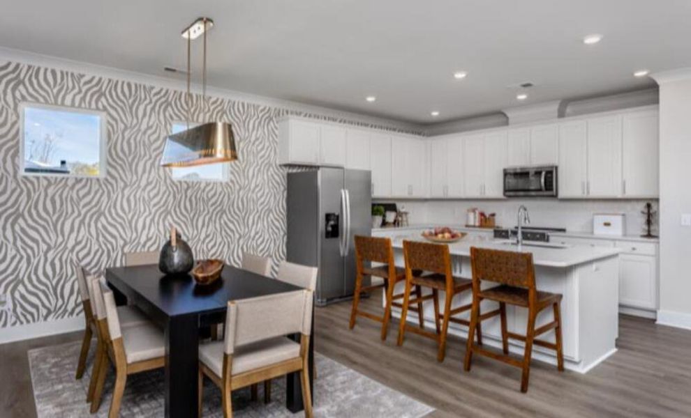 Furnished interior in a model home at Black Forest Pointe in Benson (Image 9).