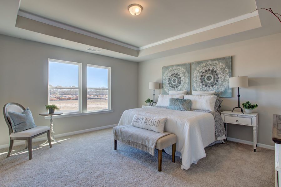 Furnished interior in a model home at Legends at Old Monroe in Monroe (Image 27).