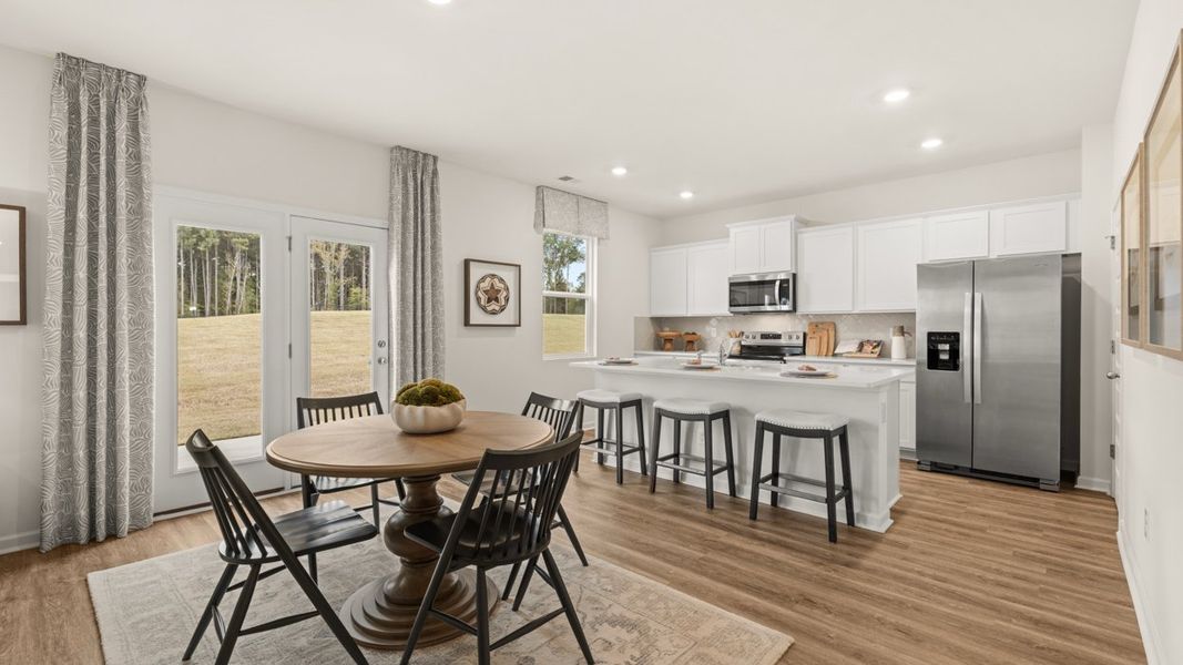 Furnished interior in a model home at Oakchase at Hampton in Hampton (Image 8).