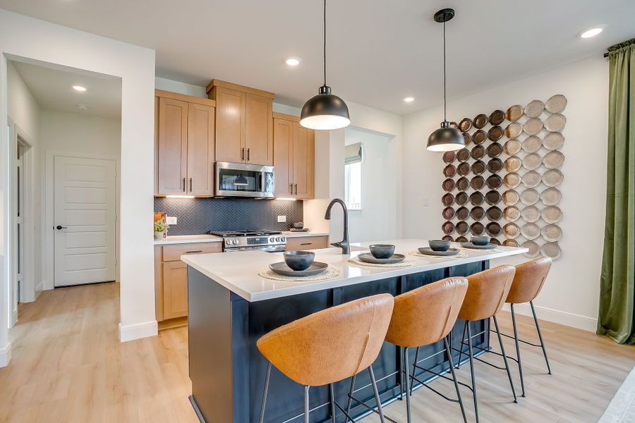 Furnished interior in a model home at Creekside in Royse City (Image 9).