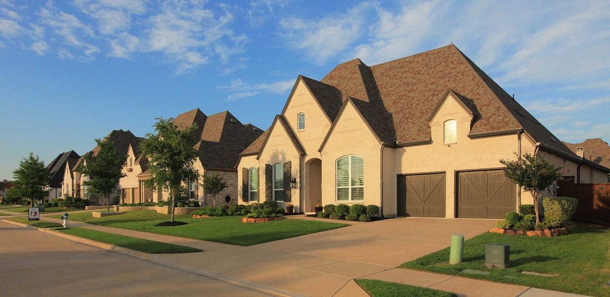 Front exterior of a home in the Cambridge Crossing: 74ft. lots community, located in Celina, TX (Image 1).